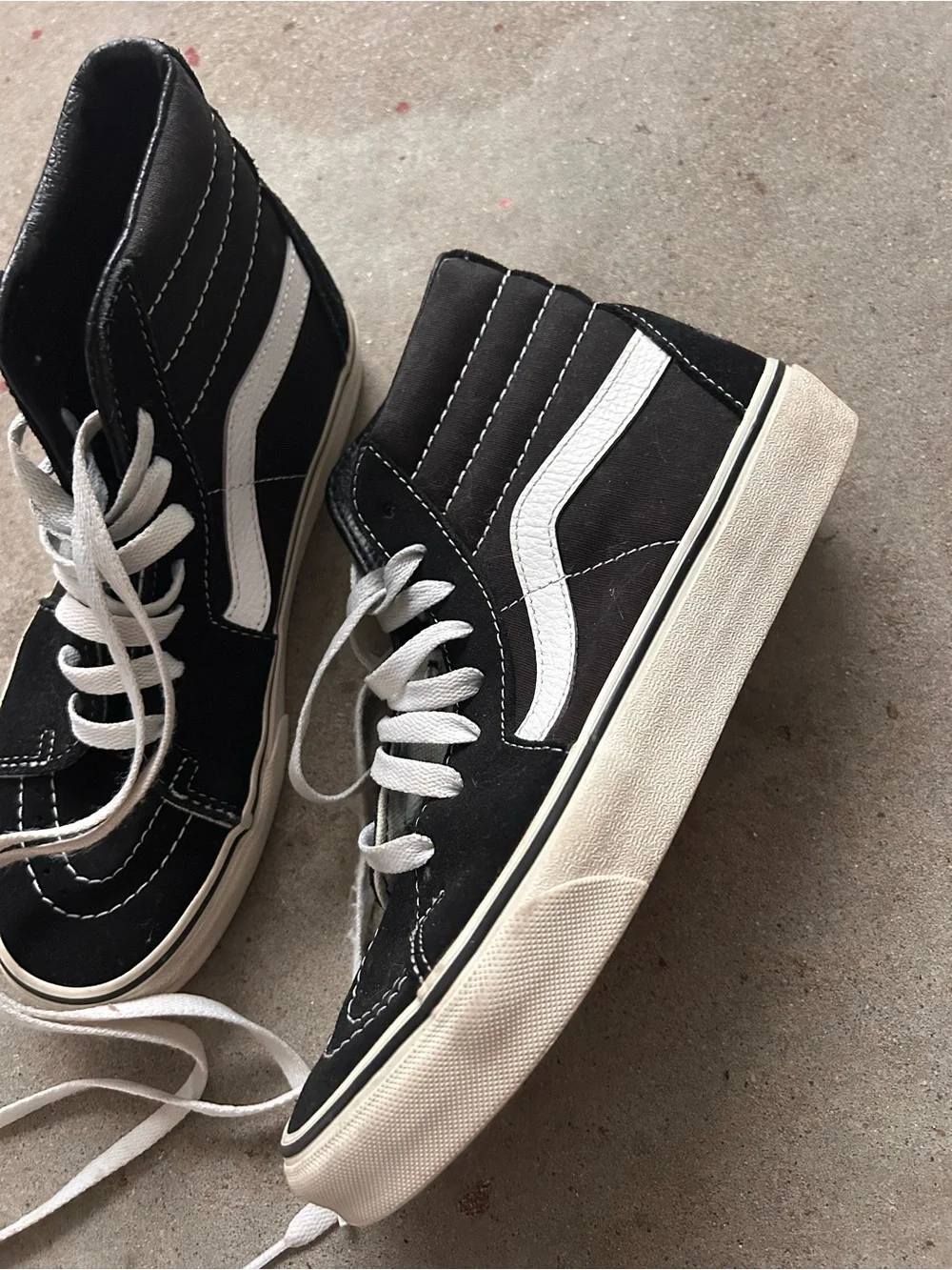 Vans Black and White High-Top Skate Sneakers - Classic Street Style